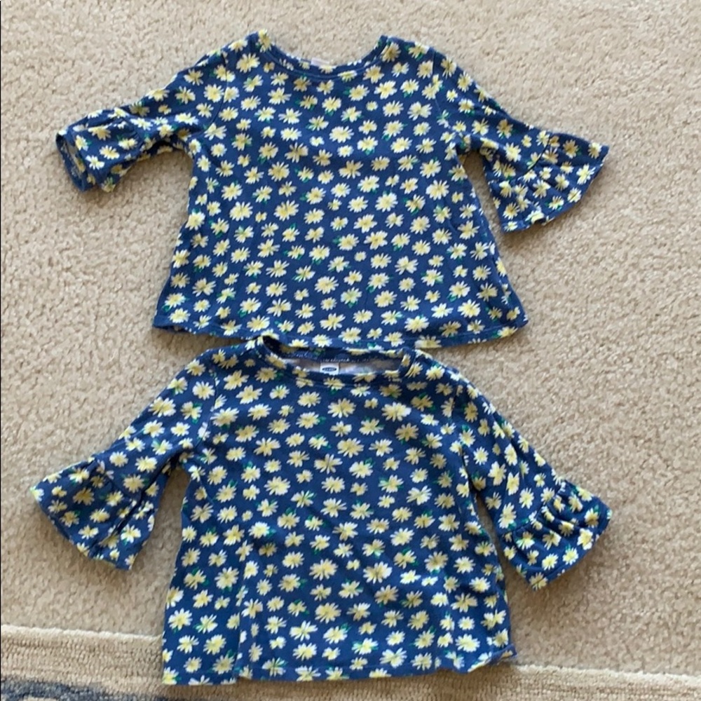 Twin girls belled sleeve Daisy tops.
